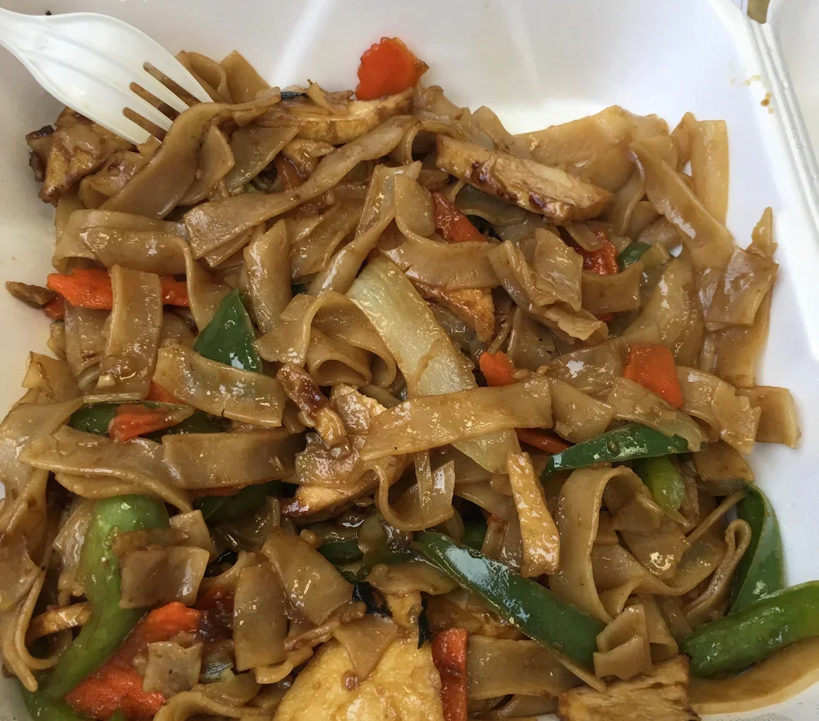 Drunken Noodles - Wide rice noodles stir-fried with Thai basil, chilis, and your choice of protein