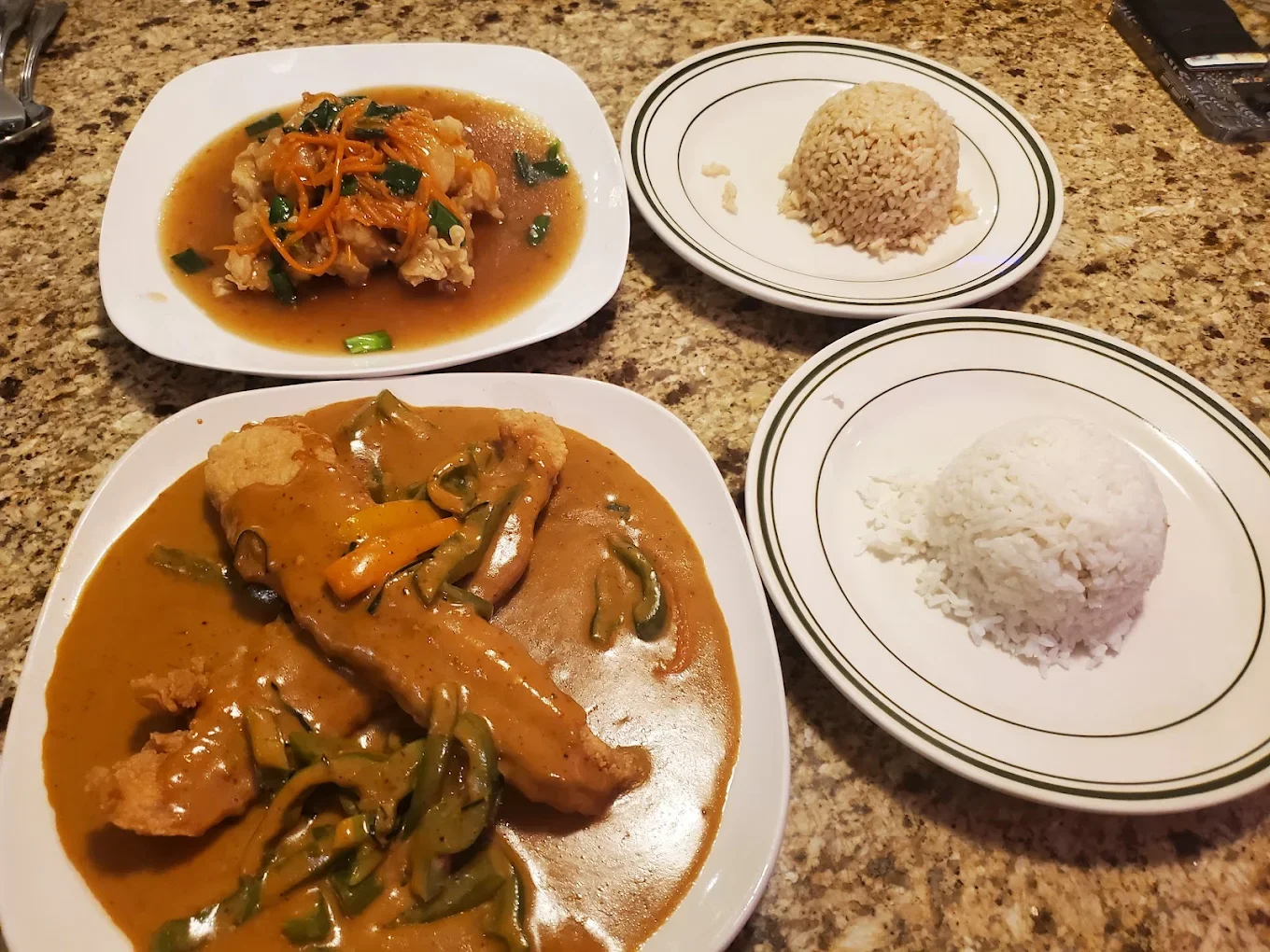 Gang Panang with Fried Catfish - A Louisiana twist on a Thai classic — our rich Panang curry sauce paired with crispy fried catfish, kaffir lime leaves, and fresh chilis.
