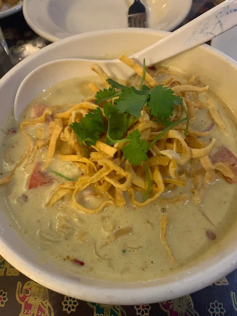 Khao Soi - Northern Thai coconut curry noodle soup with crispy noodles on top