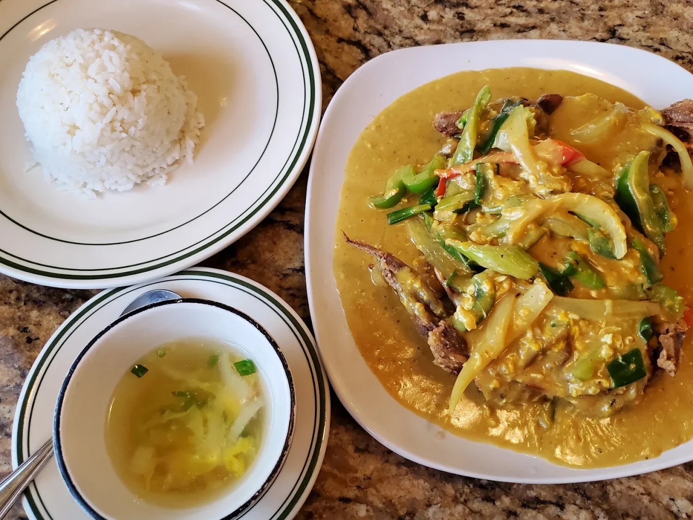 Soft Shell Crab Thai Curry - A Pimon Thai specialty — crispy soft shell crab in a rich, aromatic Thai curry sauce with coconut milk, lemongrass, and fresh basil.