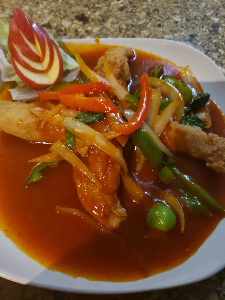 Sweet & Sour Chicken - Crispy chicken with colorful bell peppers, pineapple, and tangy sweet-sour sauce