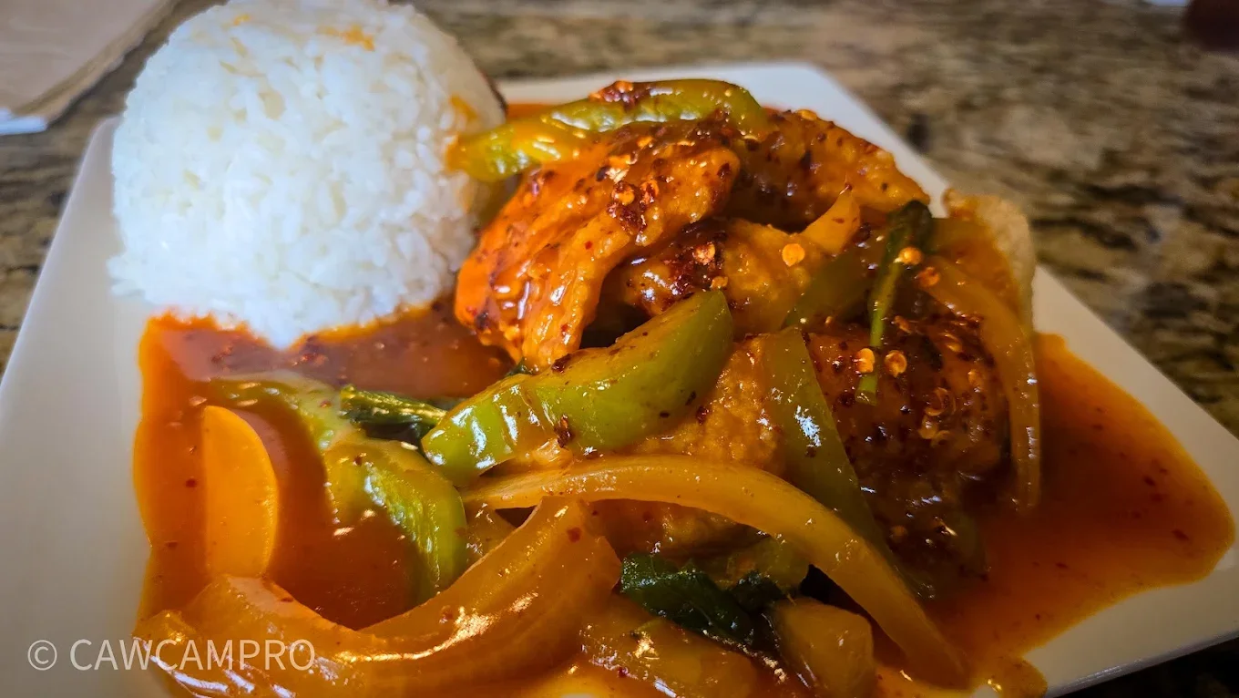 Three Flavor Fish - Crispy whole fish topped with sweet, sour, and spicy three-flavor sauce